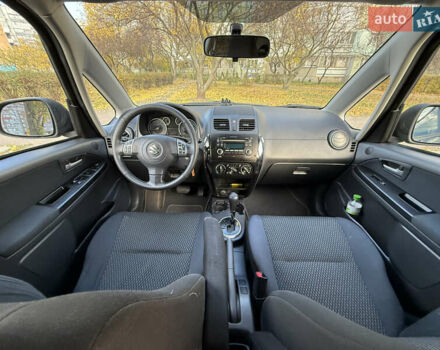 Чорний Сузукі СХ4, об'ємом двигуна 2 л та пробігом 148 тис. км за 7000 $, фото 13 на Automoto.ua