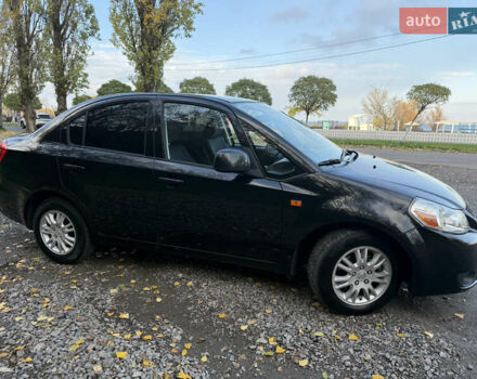 Черный Сузуки СХ4, объемом двигателя 2 л и пробегом 240 тыс. км за 8500 $, фото 5 на Automoto.ua