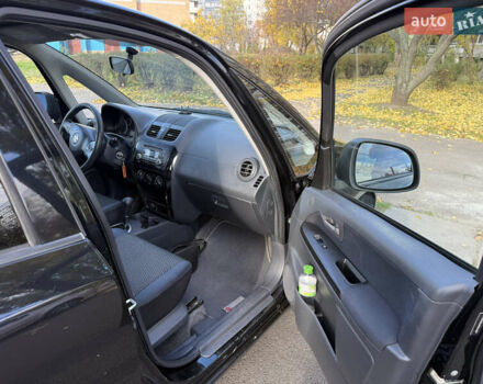 Черный Сузуки СХ4, объемом двигателя 2 л и пробегом 240 тыс. км за 8500 $, фото 41 на Automoto.ua