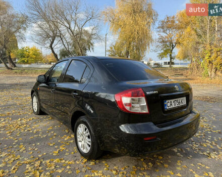 Черный Сузуки СХ4, объемом двигателя 2 л и пробегом 240 тыс. км за 8500 $, фото 4 на Automoto.ua