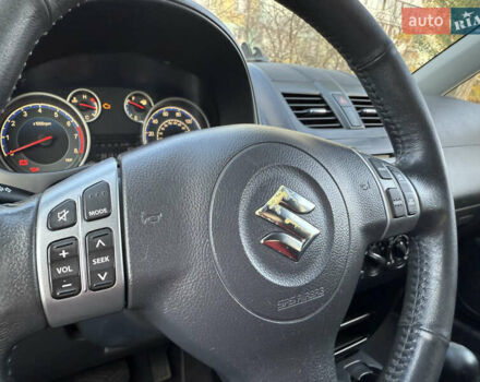 Чорний Сузукі СХ4, об'ємом двигуна 2 л та пробігом 148 тис. км за 7000 $, фото 23 на Automoto.ua