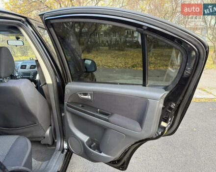 Чорний Сузукі СХ4, об'ємом двигуна 2 л та пробігом 148 тис. км за 7000 $, фото 30 на Automoto.ua