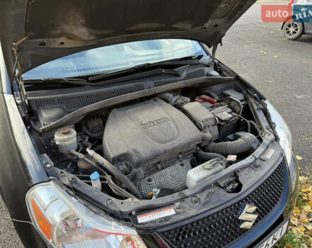 Чорний Сузукі СХ4, об'ємом двигуна 2 л та пробігом 148 тис. км за 7000 $, фото 10 на Automoto.ua