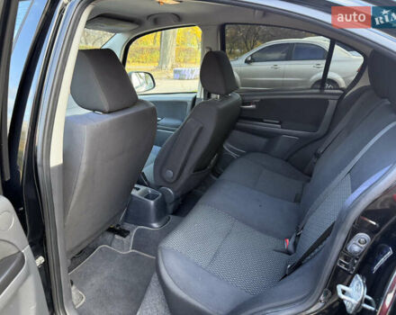 Чорний Сузукі СХ4, об'ємом двигуна 2 л та пробігом 148 тис. км за 7000 $, фото 34 на Automoto.ua