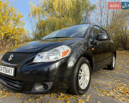 Черный Сузуки СХ4, объемом двигателя 2 л и пробегом 240 тыс. км за 8500 $, фото 1 на Automoto.ua