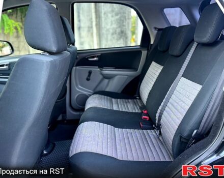 Черный Сузуки СХ4, объемом двигателя 1.6 л и пробегом 204 тыс. км за 5800 $, фото 6 на Automoto.ua