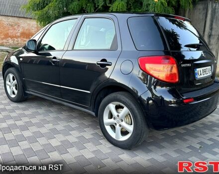 Черный Сузуки СХ4, объемом двигателя 1.6 л и пробегом 204 тыс. км за 5800 $, фото 2 на Automoto.ua