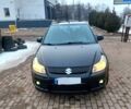 Чорний Сузукі СХ4, об'ємом двигуна 19 л та пробігом 211 тис. км за 6000 $, фото 1 на Automoto.ua