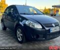 Черный Сузуки СХ4, объемом двигателя 1.6 л и пробегом 204 тыс. км за 5800 $, фото 1 на Automoto.ua