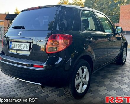 Черный Сузуки СХ4, объемом двигателя 1.6 л и пробегом 204 тыс. км за 5800 $, фото 3 на Automoto.ua