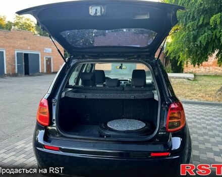 Черный Сузуки СХ4, объемом двигателя 1.6 л и пробегом 204 тыс. км за 5800 $, фото 7 на Automoto.ua