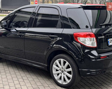 Чорний Сузукі СХ4, об'ємом двигуна 2 л та пробігом 240 тис. км за 6950 $, фото 4 на Automoto.ua