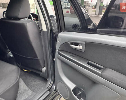 Чорний Сузукі СХ4, об'ємом двигуна 2 л та пробігом 240 тис. км за 6950 $, фото 24 на Automoto.ua