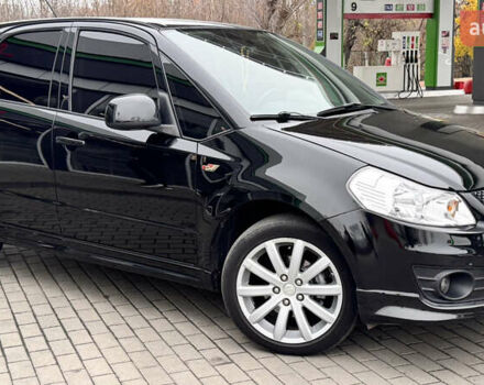 Чорний Сузукі СХ4, об'ємом двигуна 2 л та пробігом 240 тис. км за 6950 $, фото 13 на Automoto.ua