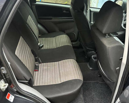 Черный Сузуки СХ4, объемом двигателя 1.6 л и пробегом 196 тыс. км за 3900 $, фото 4 на Automoto.ua