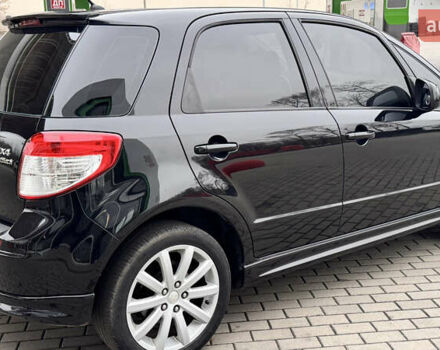 Чорний Сузукі СХ4, об'ємом двигуна 2 л та пробігом 240 тис. км за 6950 $, фото 9 на Automoto.ua