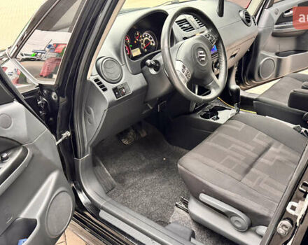 Чорний Сузукі СХ4, об'ємом двигуна 2 л та пробігом 240 тис. км за 6950 $, фото 23 на Automoto.ua