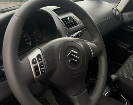 Черный Сузуки СХ4, объемом двигателя 1.6 л и пробегом 195 тыс. км за 7990 $, фото 11 на Automoto.ua