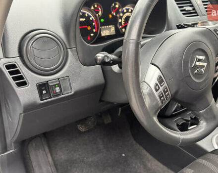 Чорний Сузукі СХ4, об'ємом двигуна 2 л та пробігом 240 тис. км за 6950 $, фото 27 на Automoto.ua