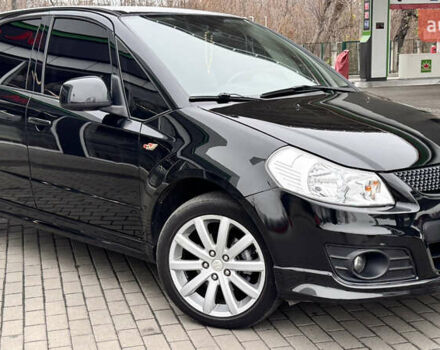 Чорний Сузукі СХ4, об'ємом двигуна 2 л та пробігом 240 тис. км за 6950 $, фото 12 на Automoto.ua