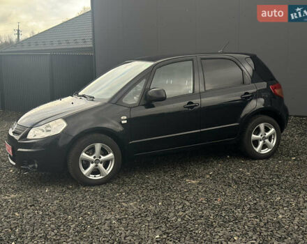 Черный Сузуки СХ4, объемом двигателя 1.6 л и пробегом 195 тыс. км за 7990 $, фото 1 на Automoto.ua