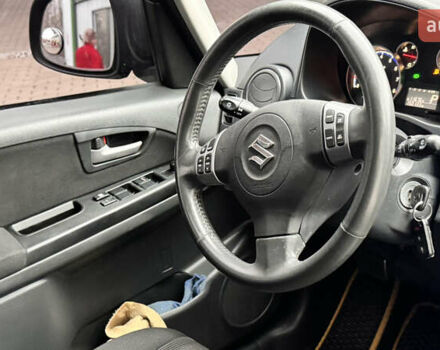 Чорний Сузукі СХ4, об'ємом двигуна 2 л та пробігом 240 тис. км за 6950 $, фото 21 на Automoto.ua