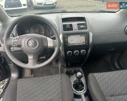 Черный Сузуки СХ4, объемом двигателя 1.6 л и пробегом 195 тыс. км за 7990 $, фото 15 на Automoto.ua