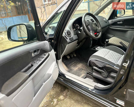 Черный Сузуки СХ4, объемом двигателя 1.6 л и пробегом 196 тыс. км за 3900 $, фото 5 на Automoto.ua