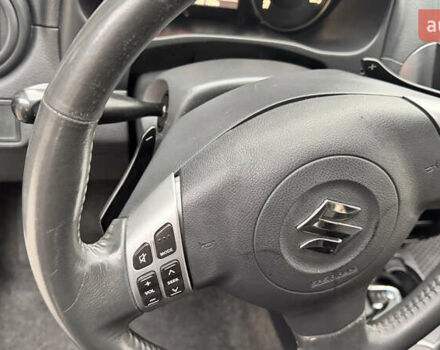 Чорний Сузукі СХ4, об'ємом двигуна 2 л та пробігом 240 тис. км за 6950 $, фото 28 на Automoto.ua