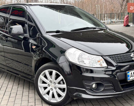 Чорний Сузукі СХ4, об'ємом двигуна 2 л та пробігом 240 тис. км за 6950 $, фото 14 на Automoto.ua