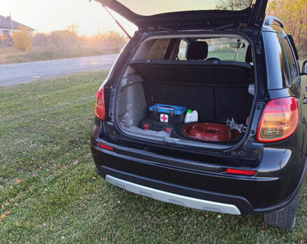 Черный Сузуки СХ4, объемом двигателя 1.6 л и пробегом 248 тыс. км за 8300 $, фото 15 на Automoto.ua