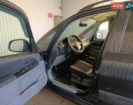 Черный Сузуки СХ4, объемом двигателя 1.6 л и пробегом 248 тыс. км за 8300 $, фото 25 на Automoto.ua