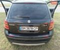 Черный Сузуки СХ4, объемом двигателя 1.6 л и пробегом 320 тыс. км за 8000 $, фото 2 на Automoto.ua