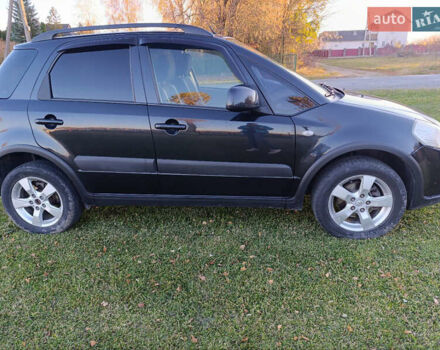 Черный Сузуки СХ4, объемом двигателя 1.6 л и пробегом 248 тыс. км за 8300 $, фото 17 на Automoto.ua