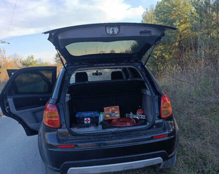 Черный Сузуки СХ4, объемом двигателя 1.6 л и пробегом 248 тыс. км за 8300 $, фото 21 на Automoto.ua