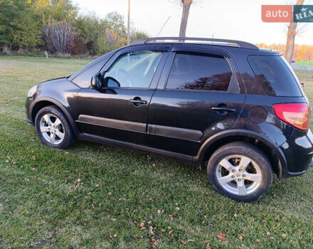 Черный Сузуки СХ4, объемом двигателя 1.6 л и пробегом 248 тыс. км за 8300 $, фото 13 на Automoto.ua