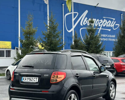 Черный Сузуки СХ4, объемом двигателя 1.59 л и пробегом 211 тыс. км за 7700 $, фото 6 на Automoto.ua