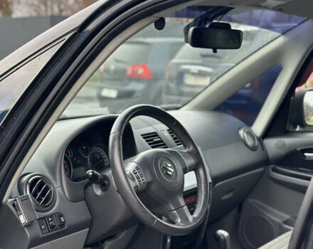 Черный Сузуки СХ4, объемом двигателя 1.59 л и пробегом 211 тыс. км за 7700 $, фото 12 на Automoto.ua