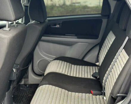 Черный Сузуки СХ4, объемом двигателя 1.59 л и пробегом 211 тыс. км за 7700 $, фото 19 на Automoto.ua