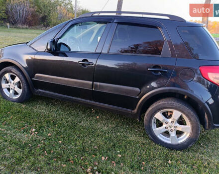 Черный Сузуки СХ4, объемом двигателя 1.6 л и пробегом 248 тыс. км за 8300 $, фото 7 на Automoto.ua
