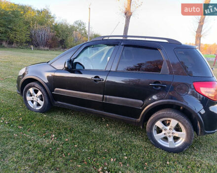 Черный Сузуки СХ4, объемом двигателя 1.6 л и пробегом 248 тыс. км за 8300 $, фото 12 на Automoto.ua
