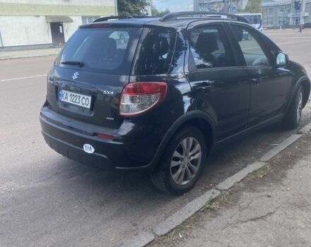 Черный Сузуки СХ4, объемом двигателя 2 л и пробегом 193 тыс. км за 8200 $, фото 1 на Automoto.ua