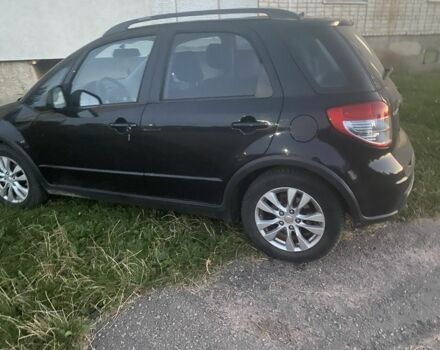 Черный Сузуки СХ4, объемом двигателя 2 л и пробегом 193 тыс. км за 8200 $, фото 2 на Automoto.ua