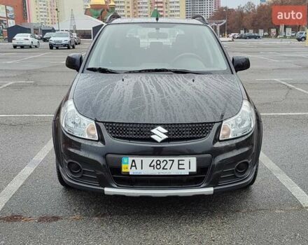 Черный Сузуки СХ4, объемом двигателя 1.6 л и пробегом 82 тыс. км за 11500 $, фото 1 на Automoto.ua