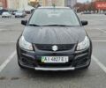 Черный Сузуки СХ4, объемом двигателя 1.6 л и пробегом 82 тыс. км за 11500 $, фото 1 на Automoto.ua