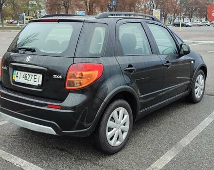 Черный Сузуки СХ4, объемом двигателя 1.6 л и пробегом 82 тыс. км за 11500 $, фото 6 на Automoto.ua