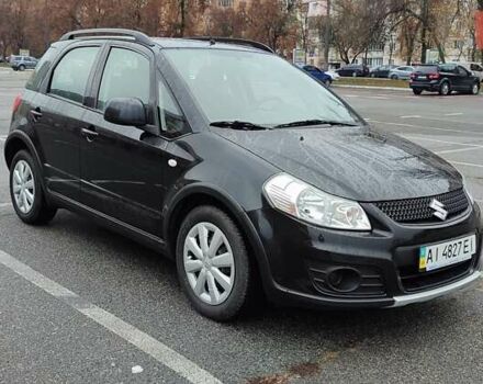 Черный Сузуки СХ4, объемом двигателя 1.6 л и пробегом 82 тыс. км за 11500 $, фото 2 на Automoto.ua
