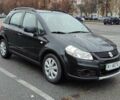 Черный Сузуки СХ4, объемом двигателя 1.6 л и пробегом 82 тыс. км за 11500 $, фото 2 на Automoto.ua