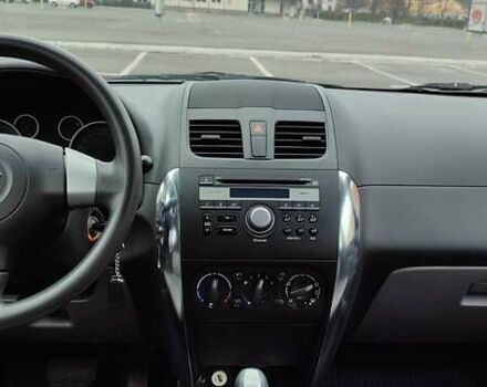 Черный Сузуки СХ4, объемом двигателя 1.6 л и пробегом 82 тыс. км за 11500 $, фото 11 на Automoto.ua