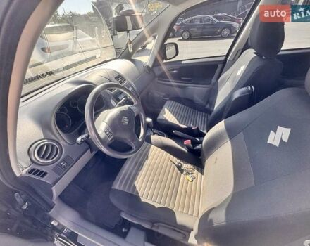 Черный Сузуки СХ4, объемом двигателя 1.6 л и пробегом 81 тыс. км за 11900 $, фото 12 на Automoto.ua